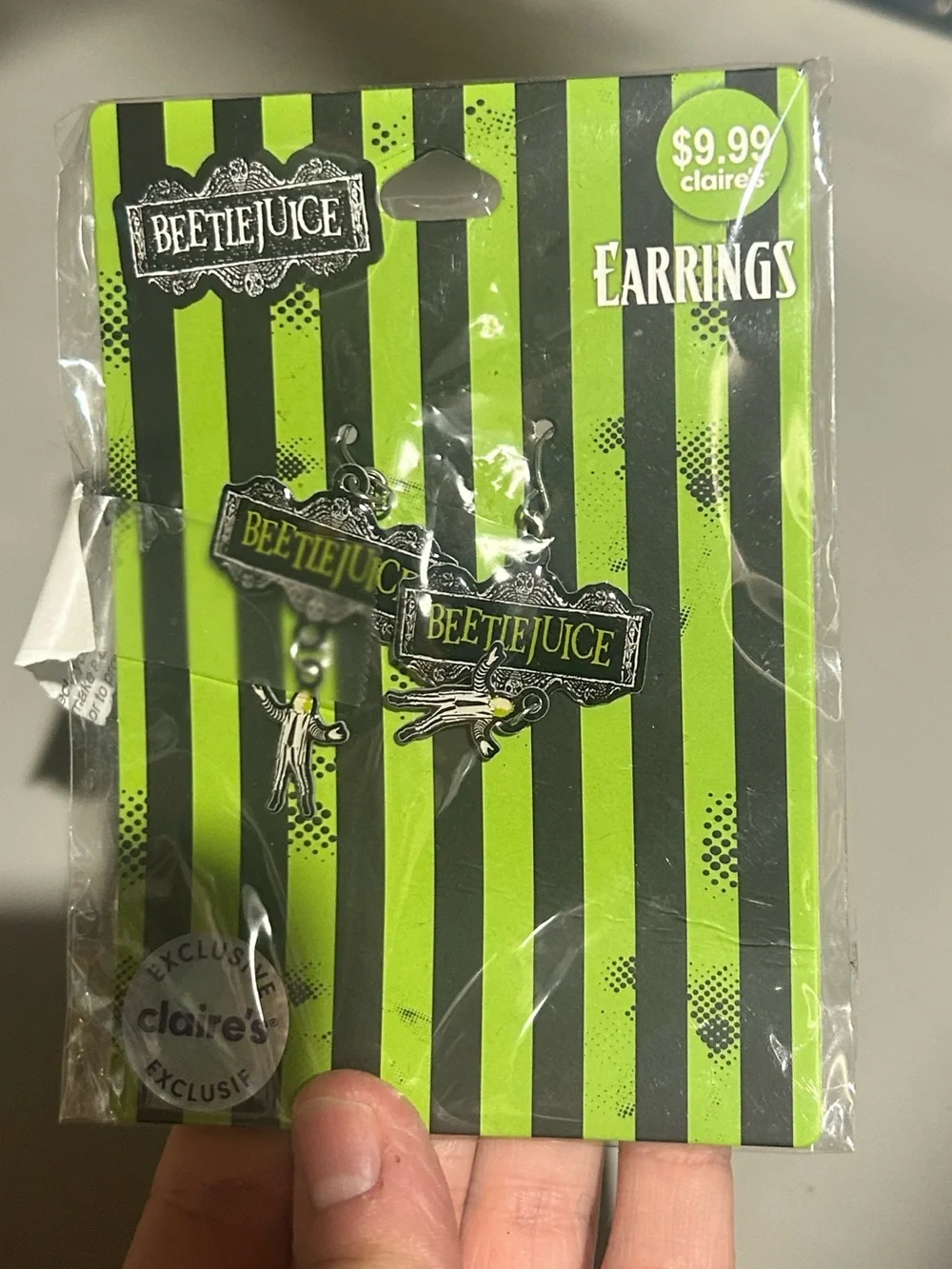 Beetlejuice Green & Black Striped Earrings - Claire's Exclusive